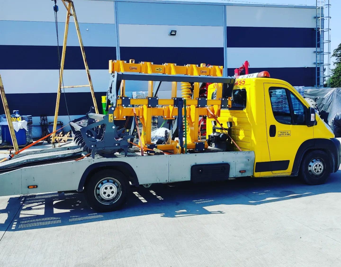 Agricultural attachment loaded on a Nikolić flatbed